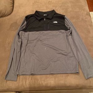 Used small bleach stain in the middle north face quarter zip